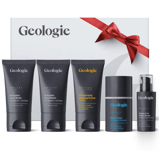 Geologie 5 piece Ultimate Skincare Gift Set with 2 bottles and 3 tubes on a white background.
